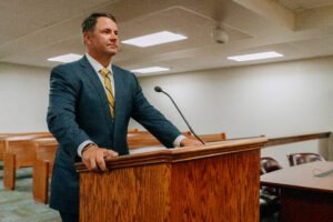 Charlie Williams at microphone